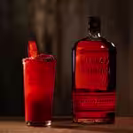 A glass of Bulleit Bourbon with tonic and ice. Click to find our recipe for bourbon with tonic