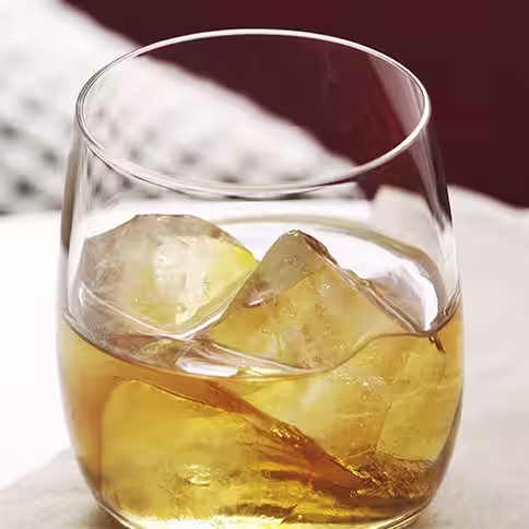 A glass of Bulleit Bourbon on the rocks. Click to find our recipe for bourbon on the rocks