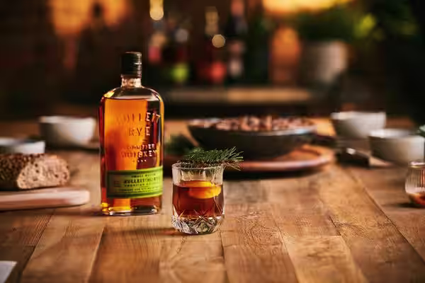 A glass of Bulleit Bourbon with tonic and ice. Click to find our recipe for bourbon with tonic