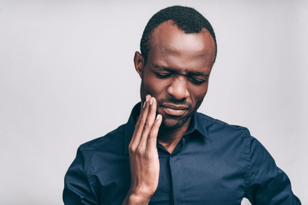 If you have a bad cold and also a tooth ache, there is likely a non-cavity-related reason for that. Your sinuses are very near your jawbone, so when the sinus cavities get blocked, it can cause discomfort or pain that seems to be in your teeth.