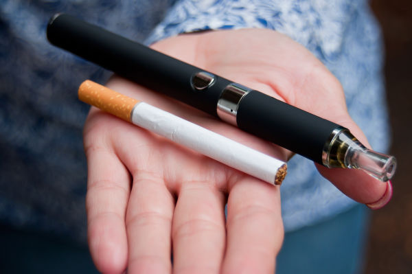 Vaporizing, or “vaping” tobacco products, have become a hot trend in the last 15 years, especially among young people. In fact, 16 percent of high school students reported using e-cigarettes in 2015, compared to just 1.5 percent in 2011. Many people believe that vaping is safer than smoking conventional cigarettes, but it’s important to understand that e-liquids usually contain nicotine and other chemicals that affect the mouth and body – no matter the delivery route. 
   
