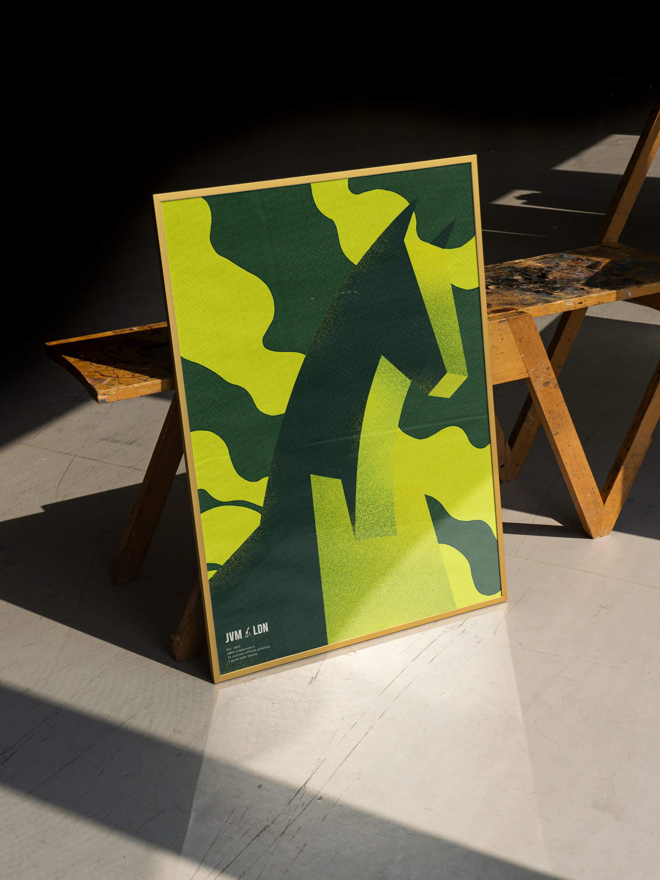 Jung von Matt London framed print of troyan horse in green camouflage pattern