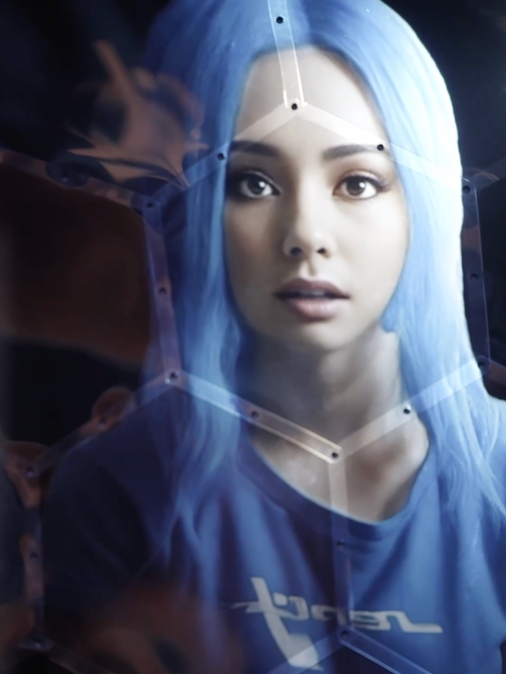 Screenshot of Jung von Matt’s Bubbleverse“ film, a walkable universe of social media filter bubbles, showing an AI generated character with long sleek blue-white hair and a blue t-shirt
