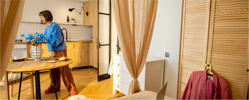 A woman packing up her one bedroom flat