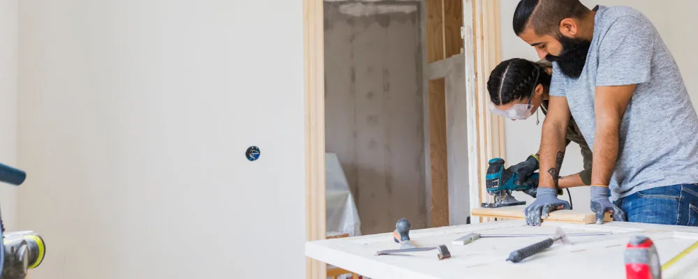 Couple doing home renovations