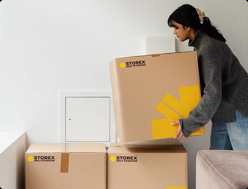 Woman stacking boxes