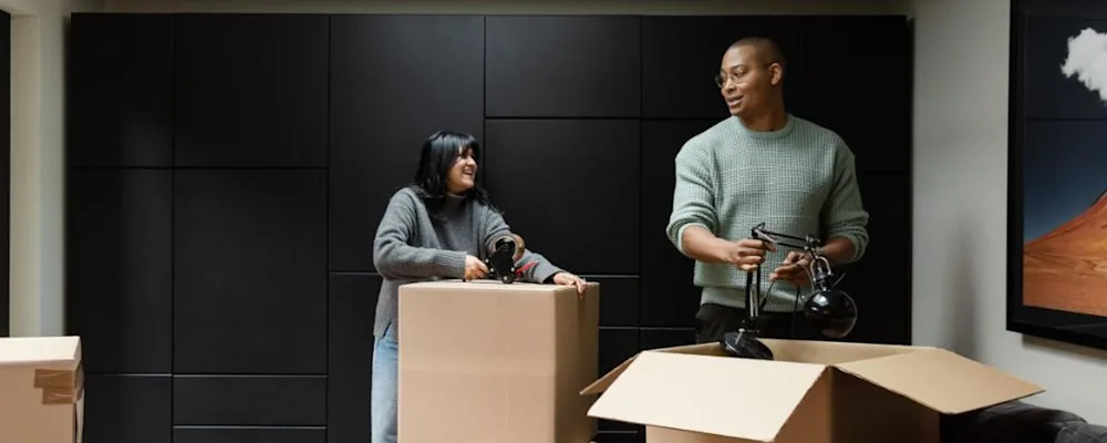 Feature Image Couple smiling while moving