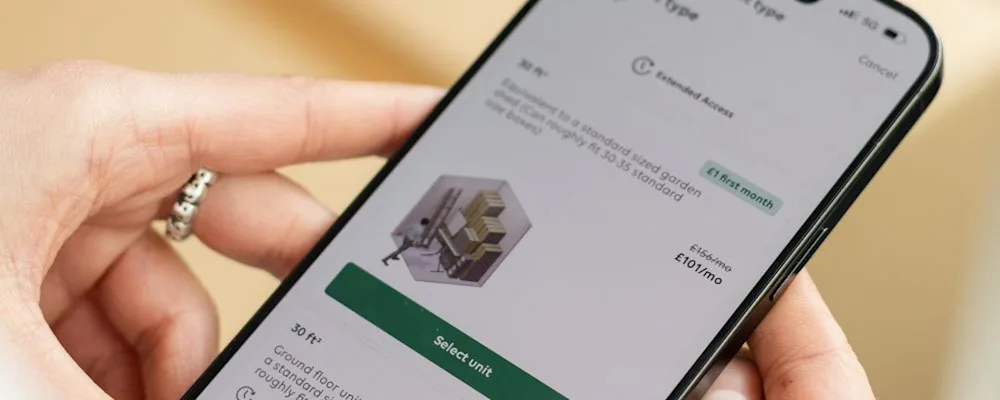 A person using the STOREX app to order a unit