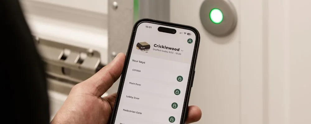 A person using the STOREX app to unlock their unit