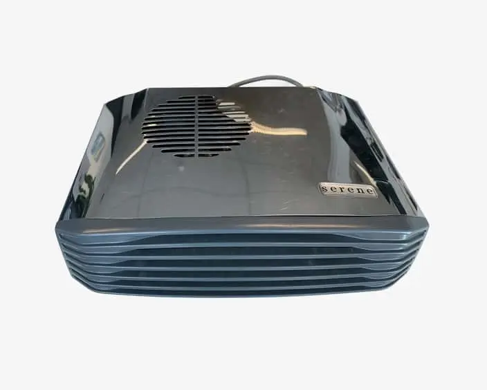 Gray rectangular bathroom heater with ventilation grille on top and ridged sides, viewed from above at an angle.