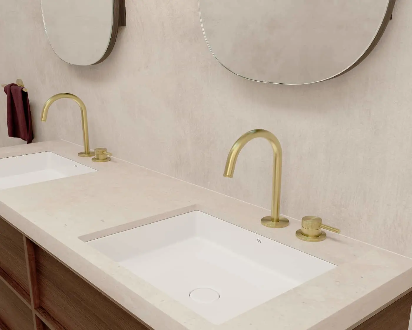 Double vanity with white countertop, brass faucets, round mirrors, and wood cabinetry in modern bathroom.