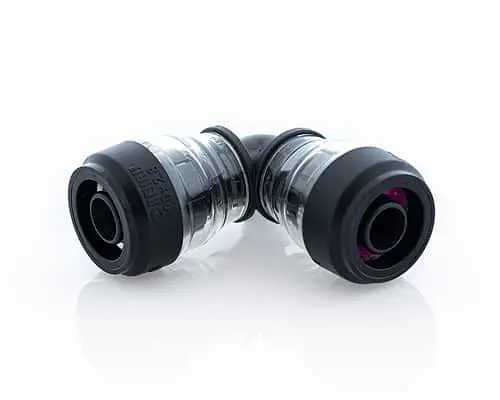 Metal elbow pipe fittings with black rubber seals on white background