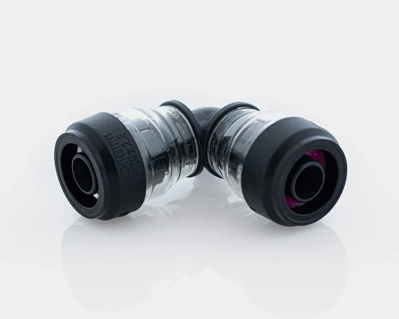 Metal elbow pipe connector fitting with rubber seals on white background