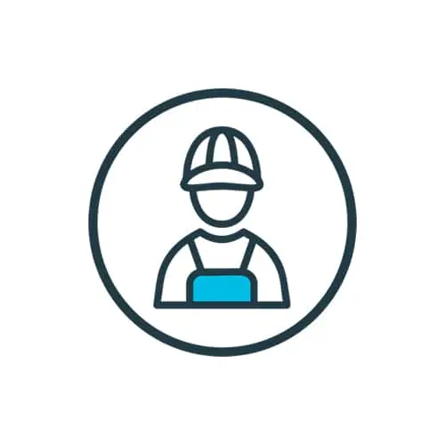 Icon of a construction worker wearing a hard hat and blue overalls inside a dark circle on white background.