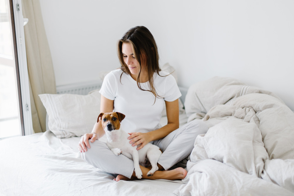 Canva - A Portrait Of A Woman With her Dog At Home