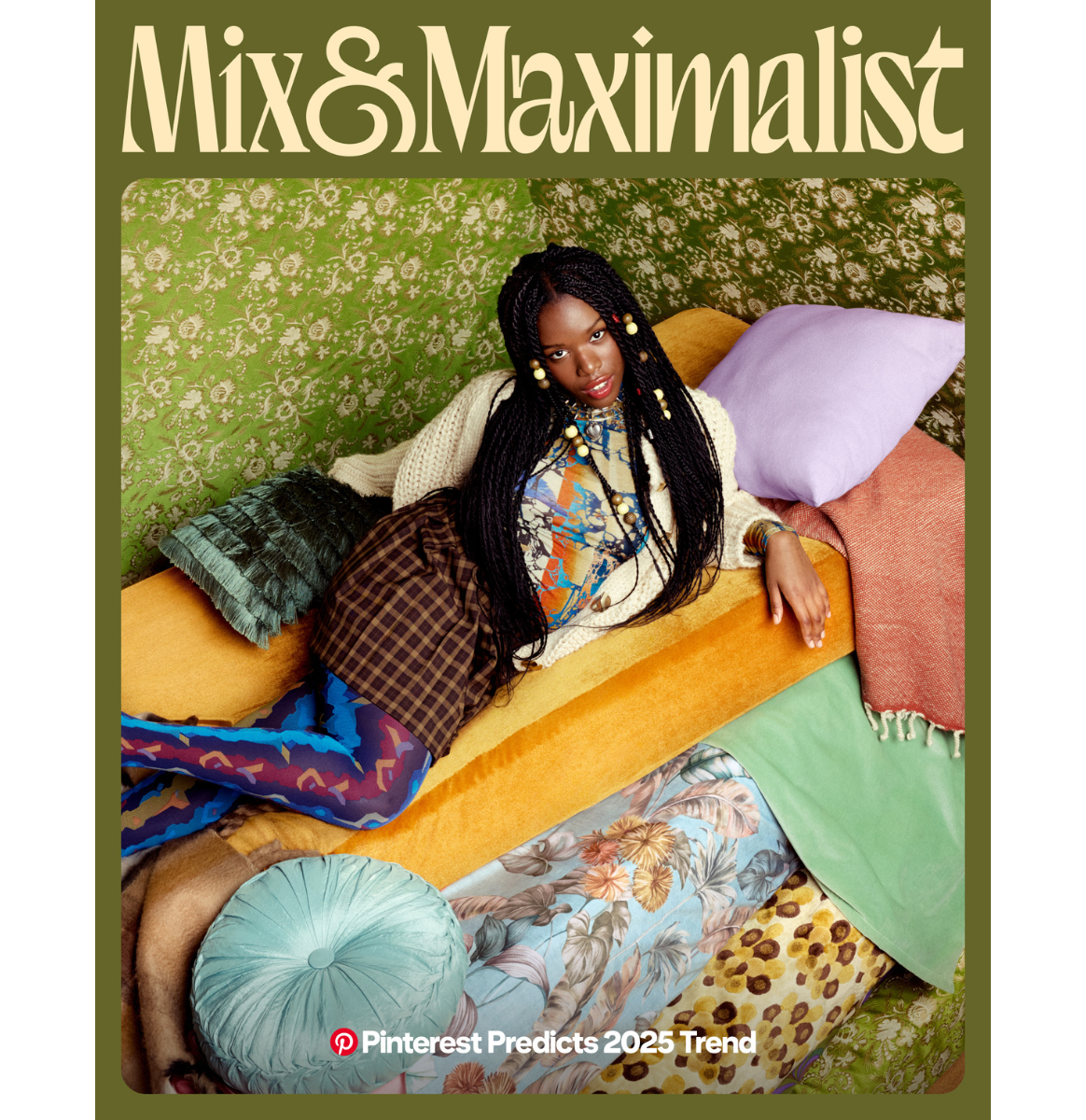 Woman reclines on an orange couch covered in blankets and pillows of different colors and patterns
