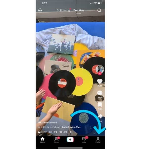 tiktok screen with arrow pointing to the profile page