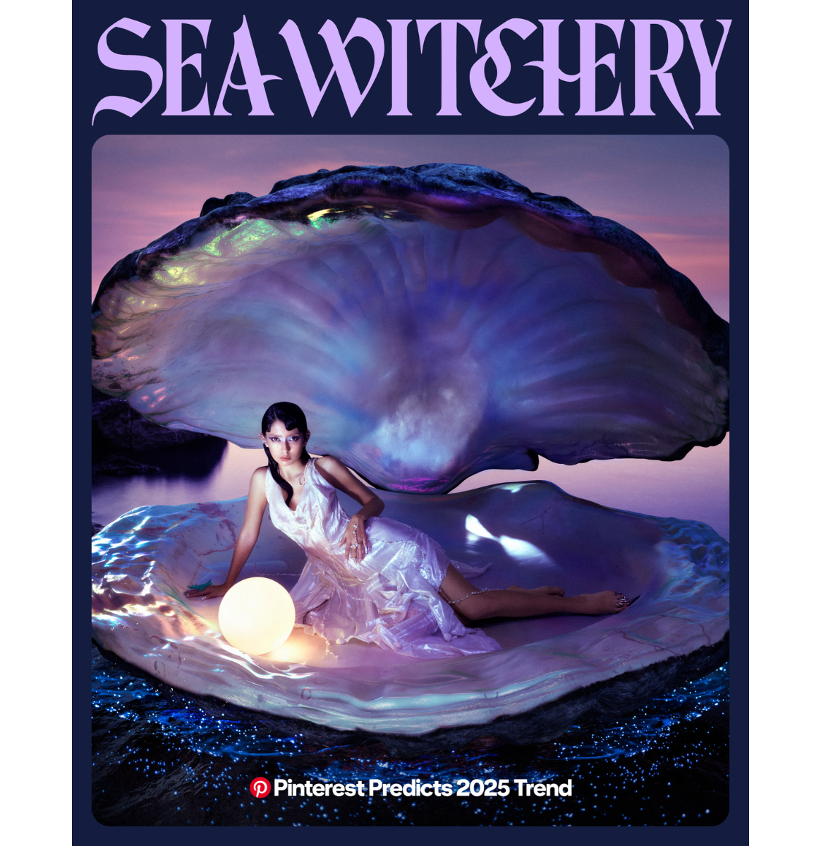 Woman in shimmery purple dress reclines in giant oyster shell with a light up pearl illuminating her face