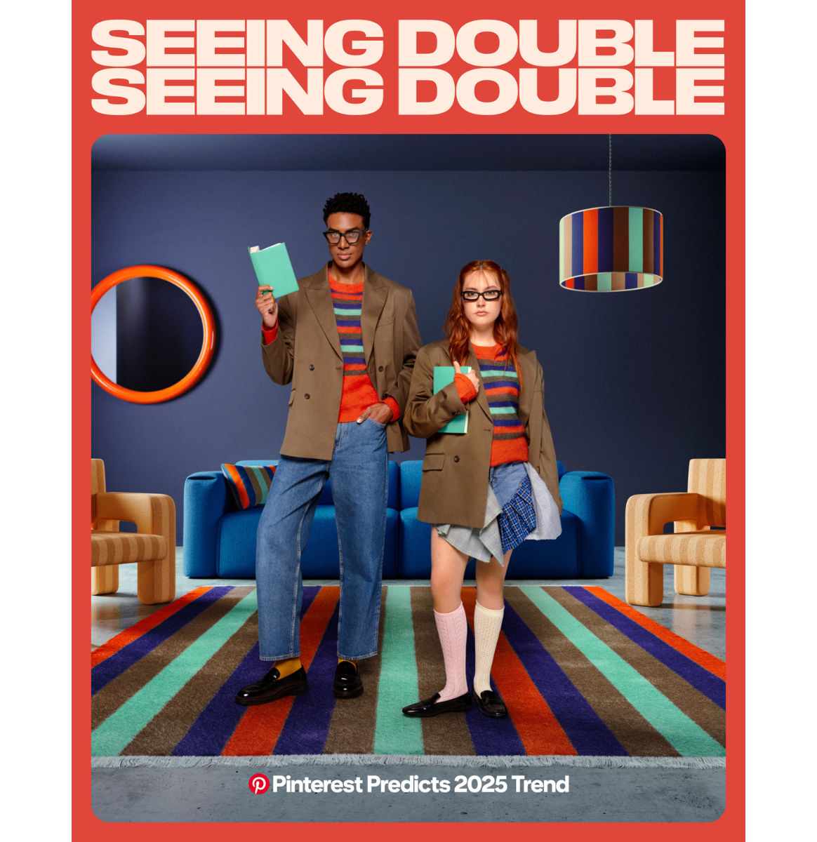 Couple in matching brown jacket, jean bottoms, striped sweaters, and black loafers hold mint notebooks in retro living room