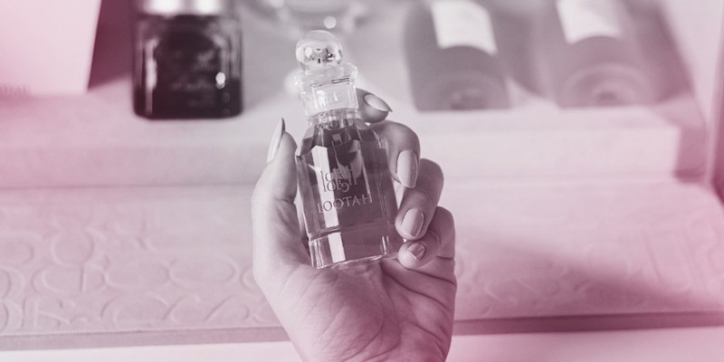 Woman holding lootah perfume