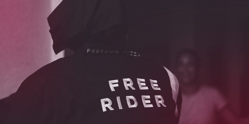 Back of jacket with the words FREE RIDER written on them