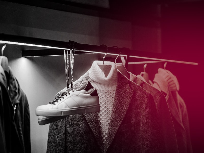 Clothes and shoes on a rack