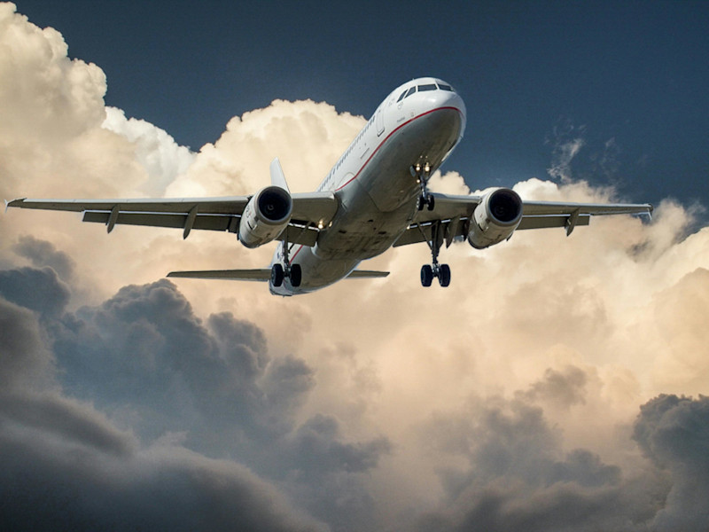 An aeroplane flying in the sky