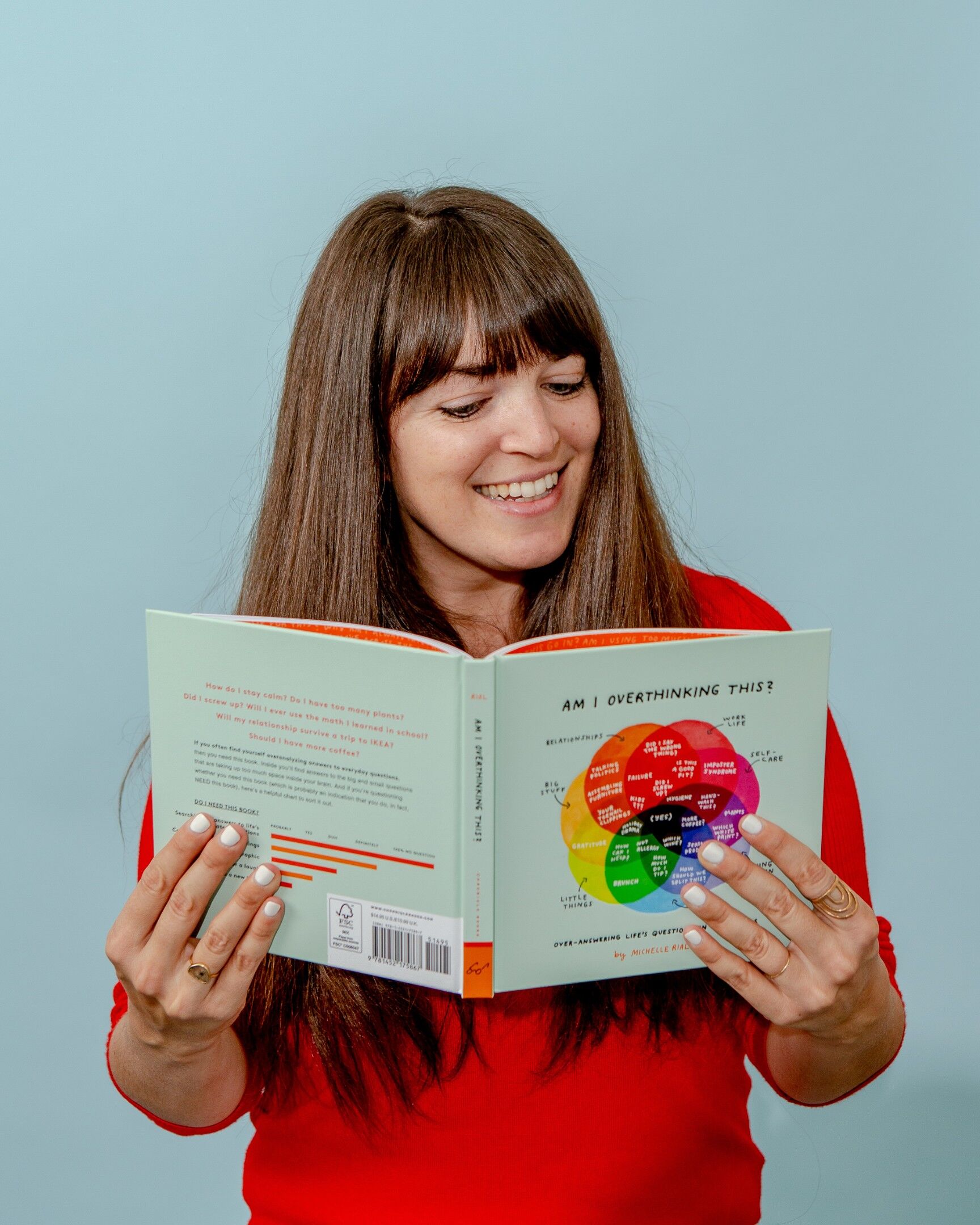 Michelle Rial with her book, Am I Overthinking This? 