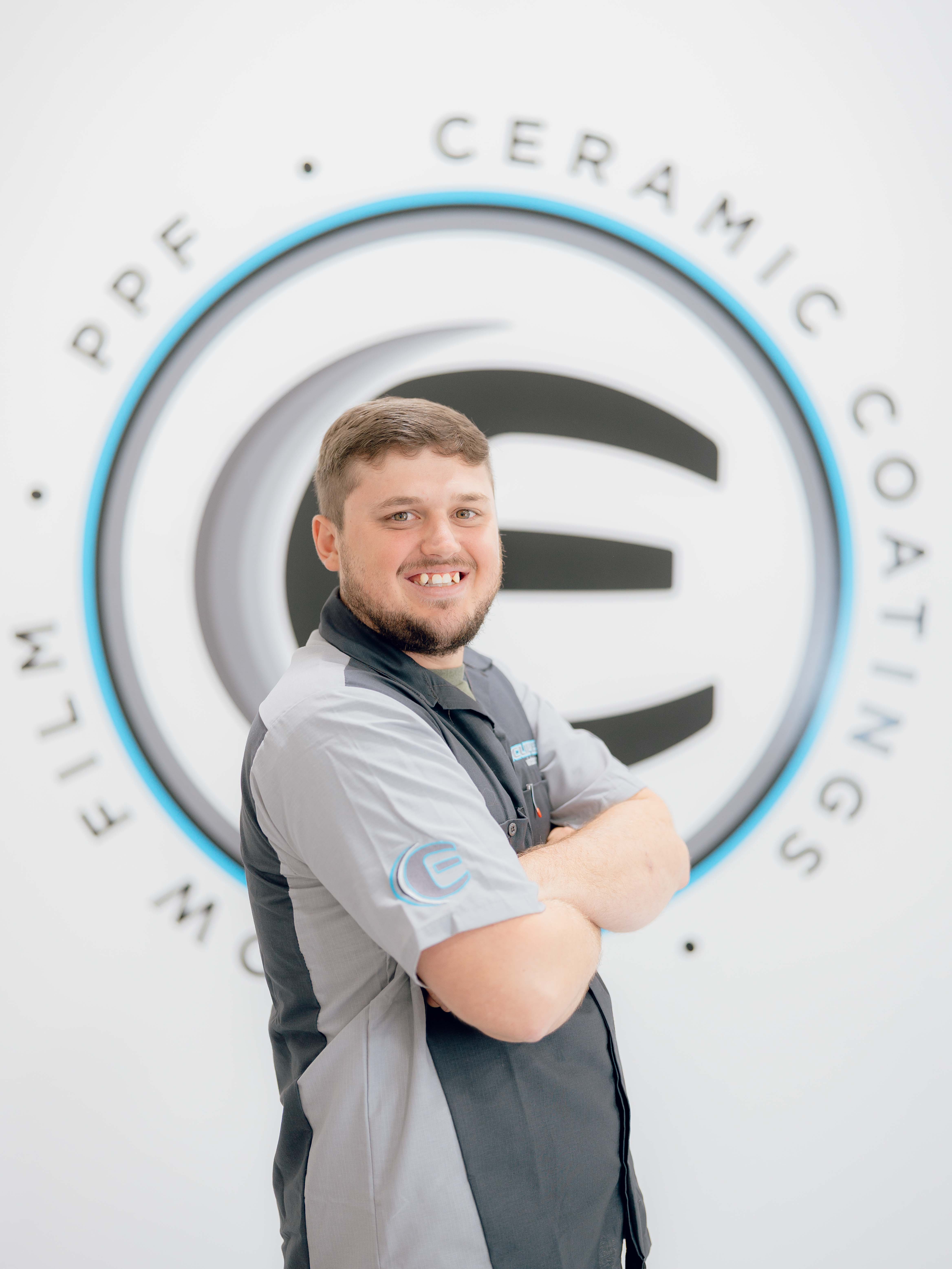 An expert tint installer at Eclipse Window Tinting.