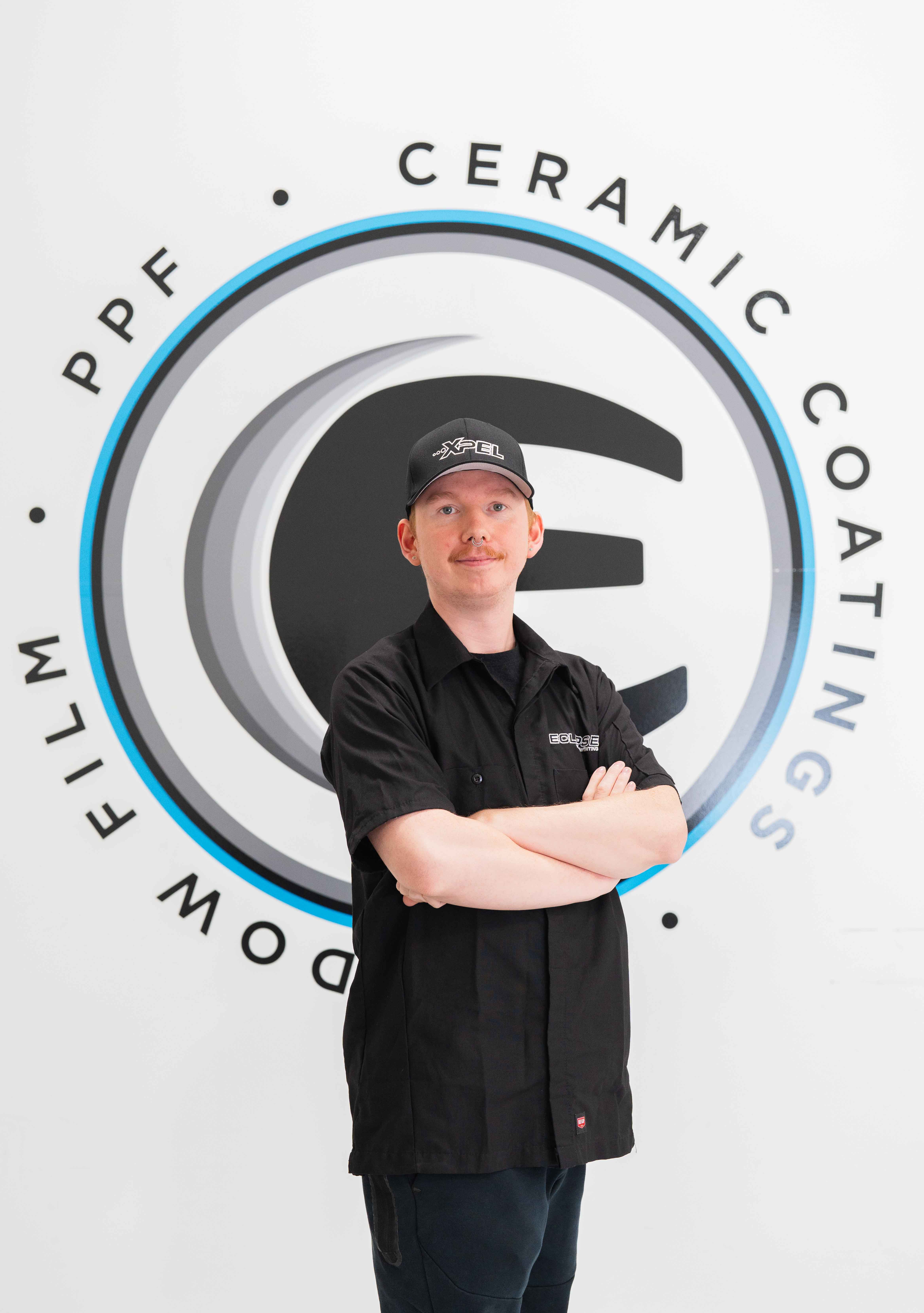 A ceramic coating tint installer at Eclipse Window Tinting.