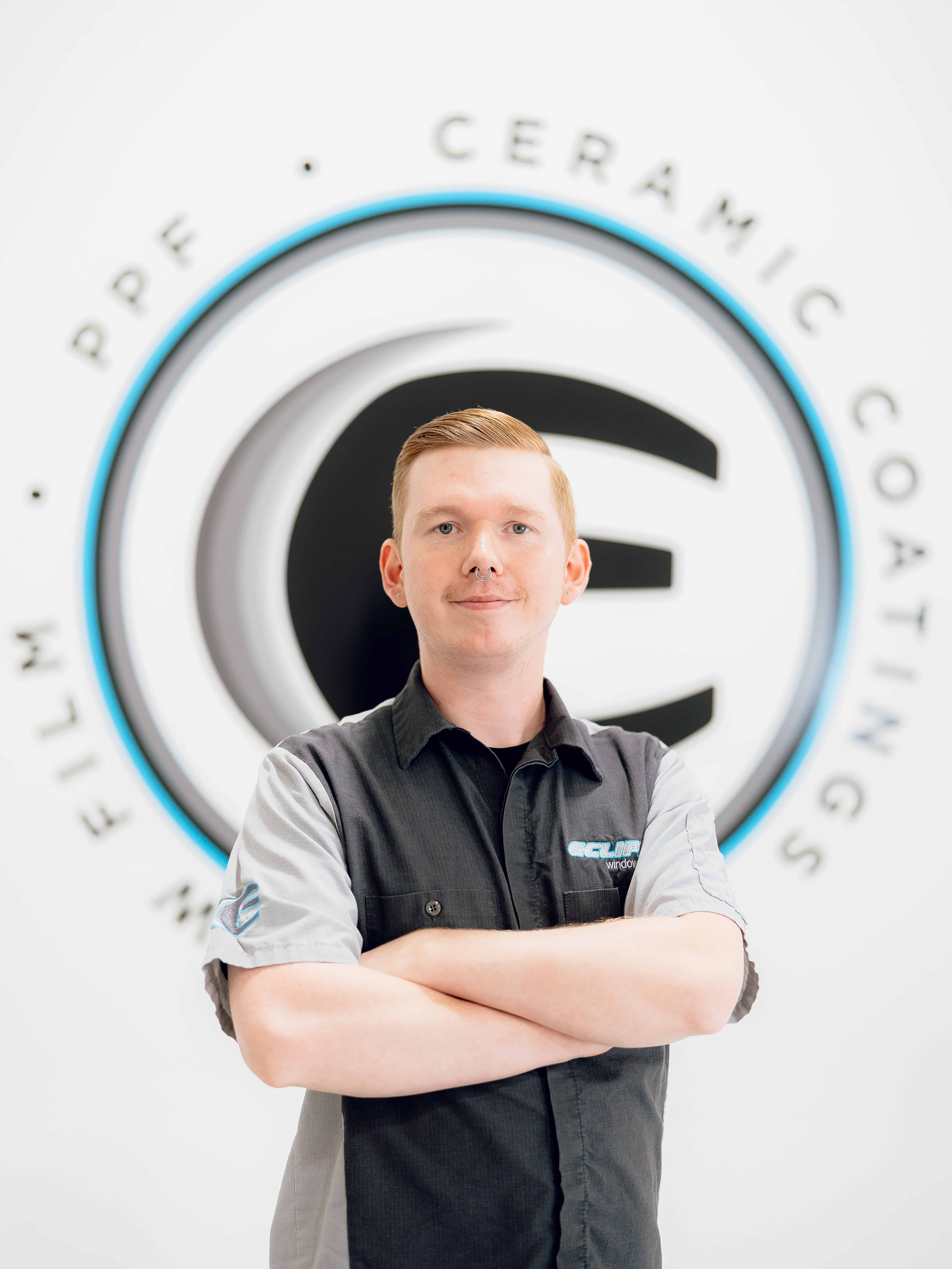 A ceramic coating tint installer at Eclipse Window Tinting.