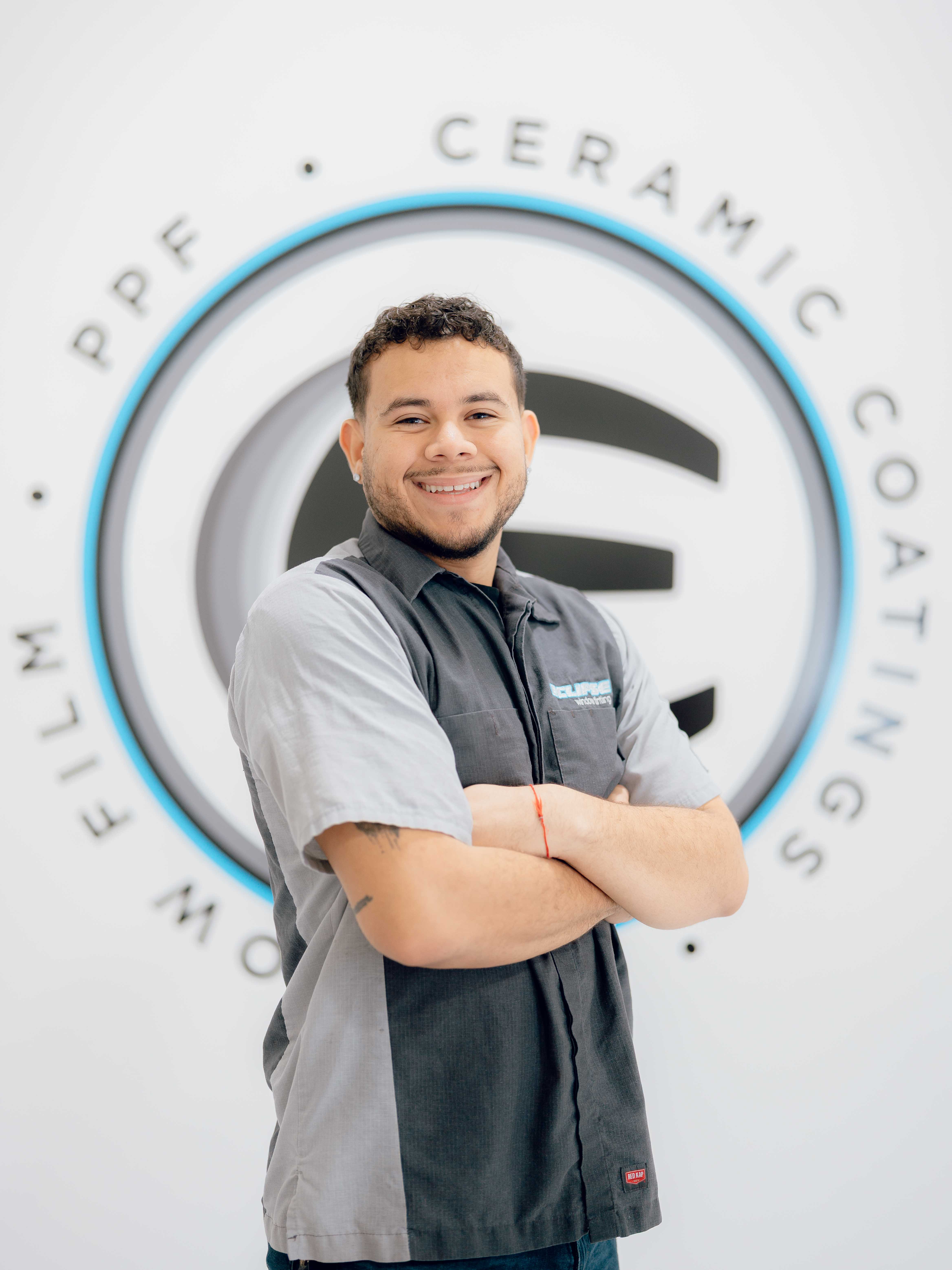 A ceramic coating tint installer at Eclipse Window Tinting.