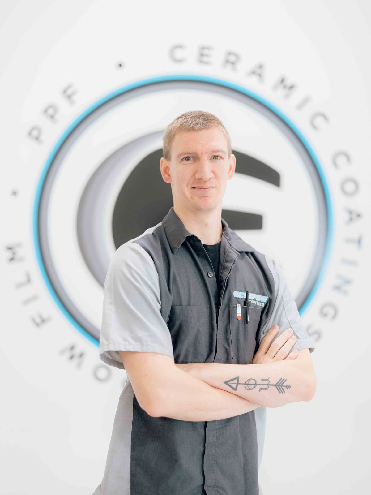 An expert tint installer at Eclipse Window Tinting.