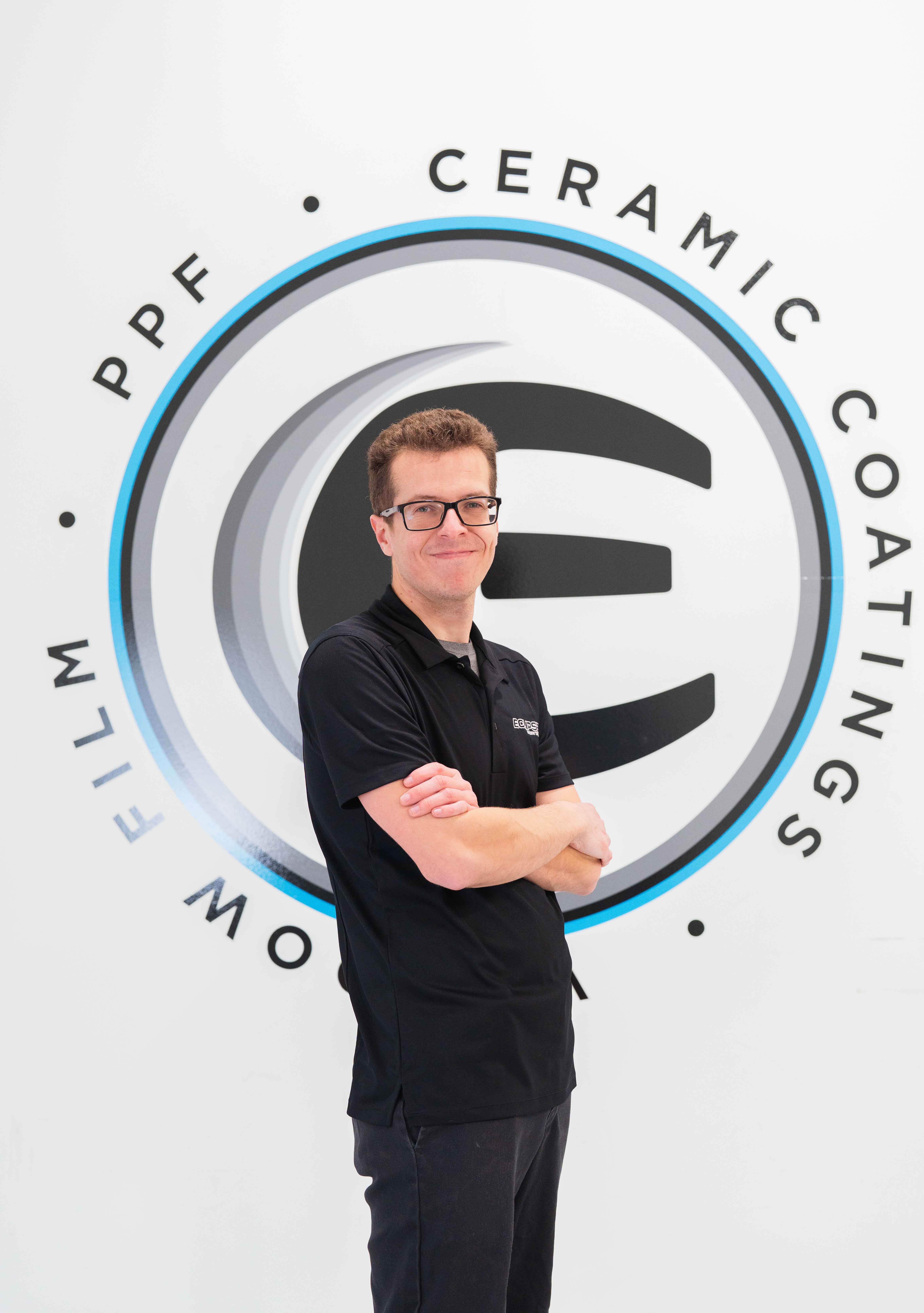 A ceramic coating tint installer at Eclipse Window Tinting.