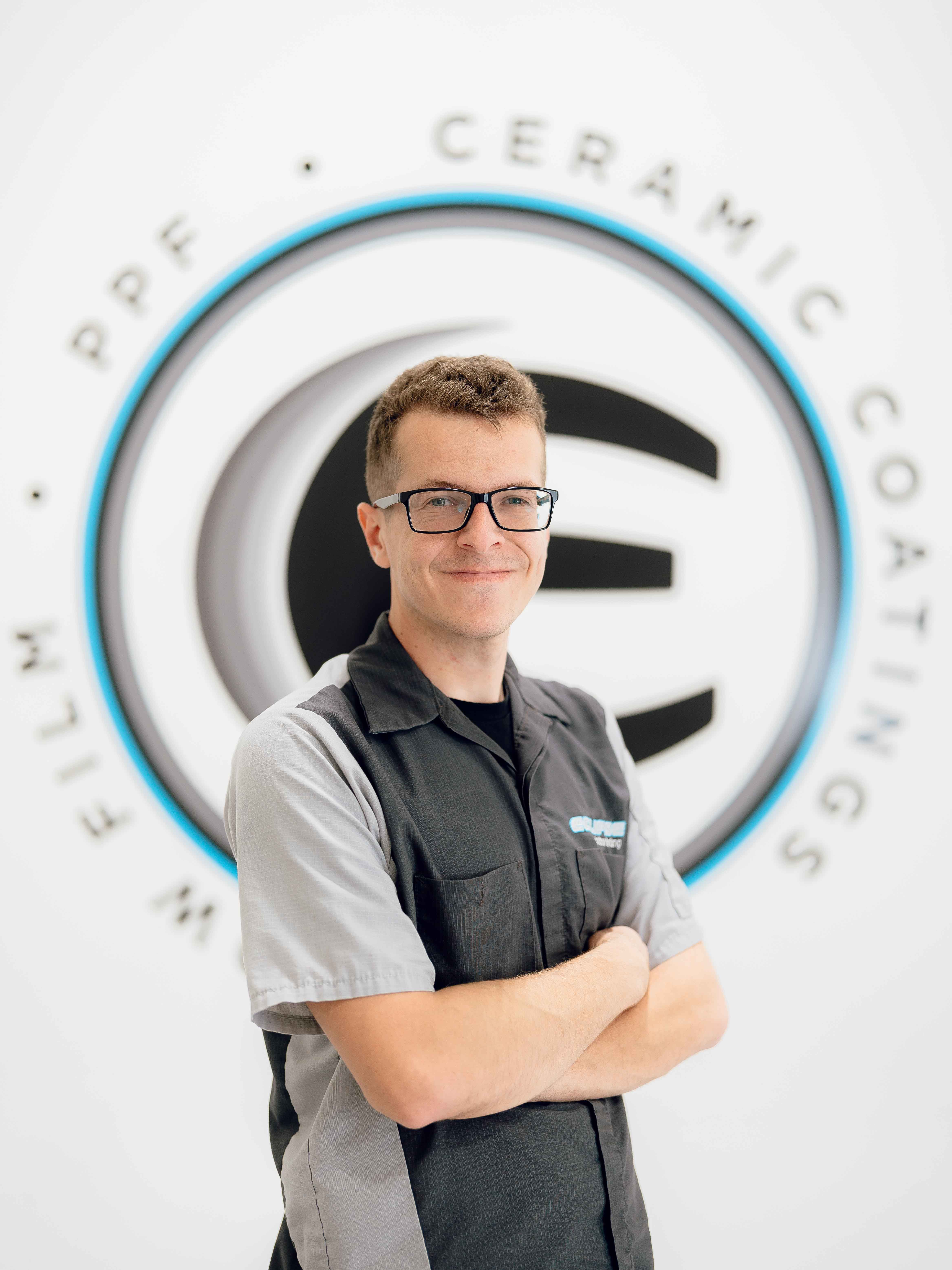 A ceramic coating tint installer at Eclipse Window Tinting.