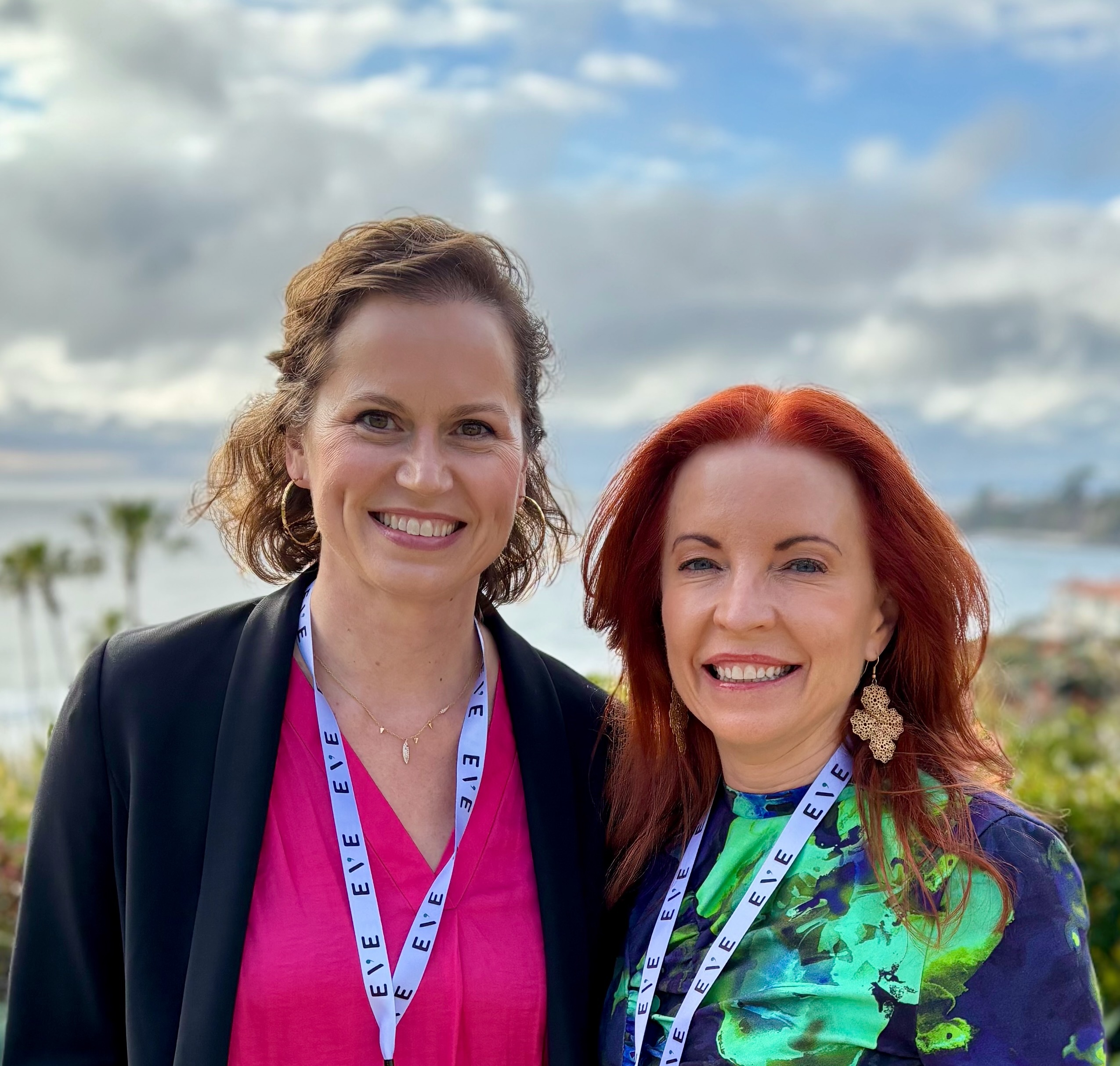 Eve founders smiling to the camera in a sunny day