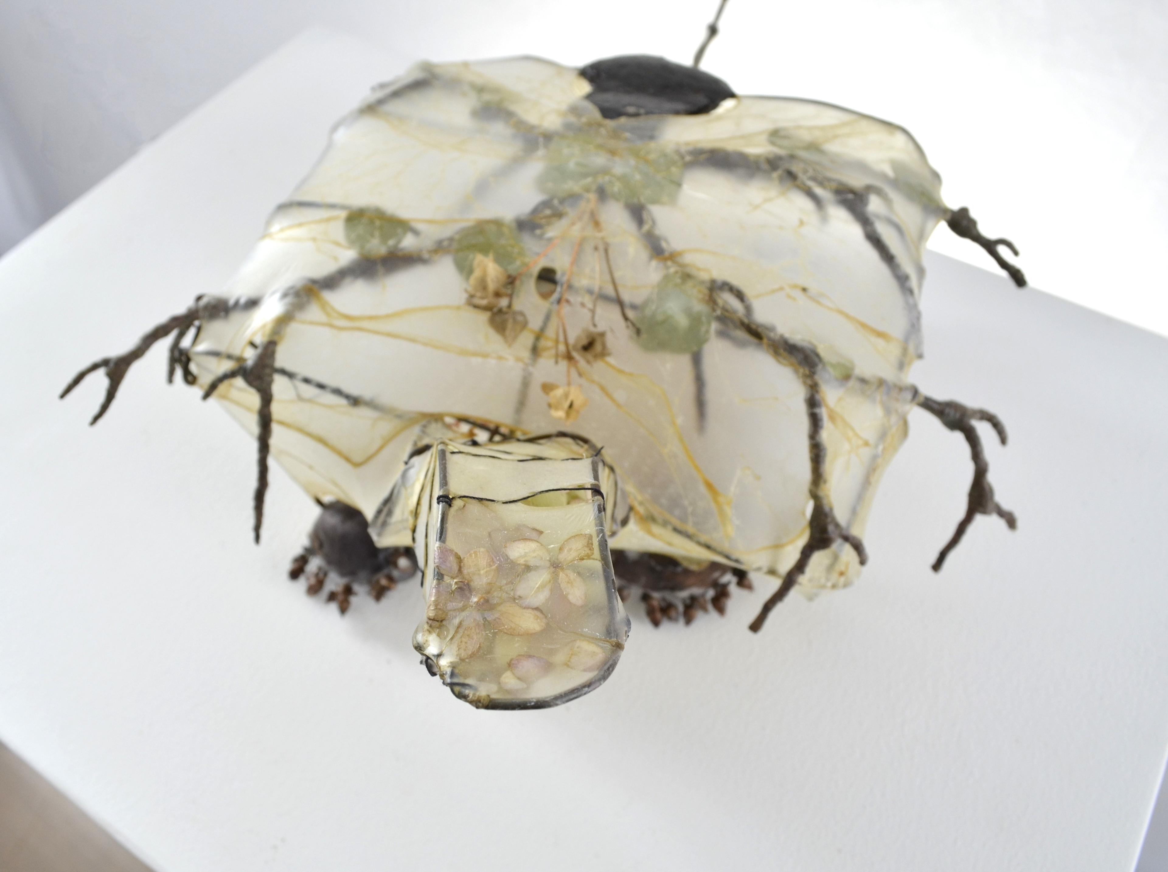 Tosia is a mother turtle made from a variety of found ephemera utilizing sculptural collaging and sewing techniques.  SOLD