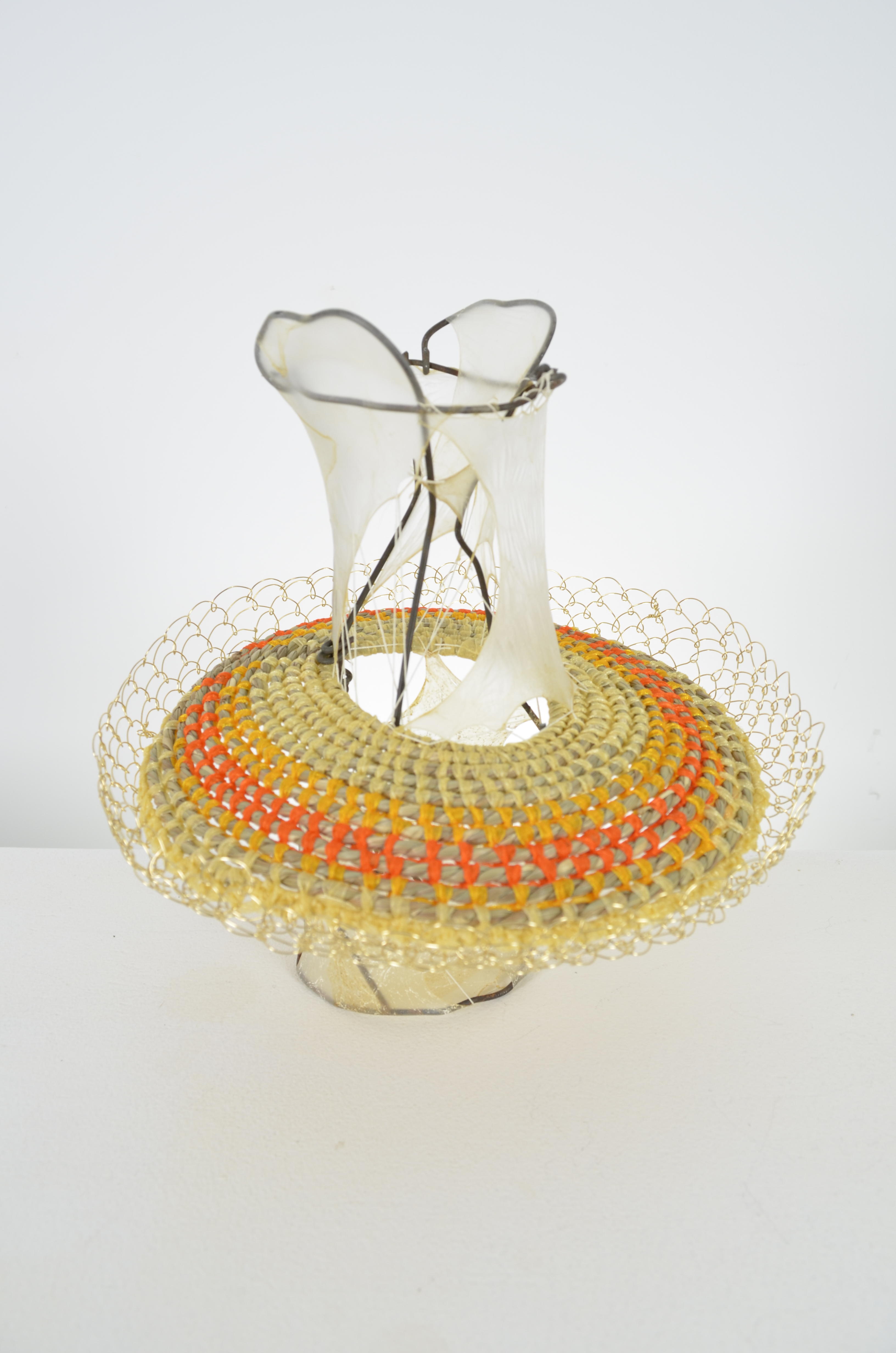 found fence, gut, seagrass, chiffon ribbon, & brass wire