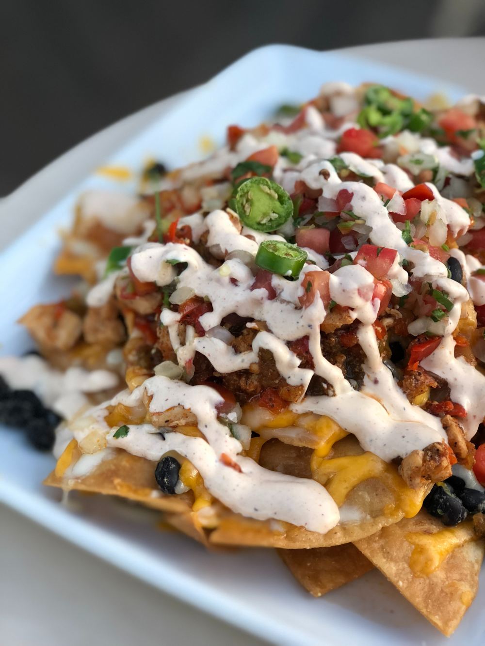 Nachos with sauce on top