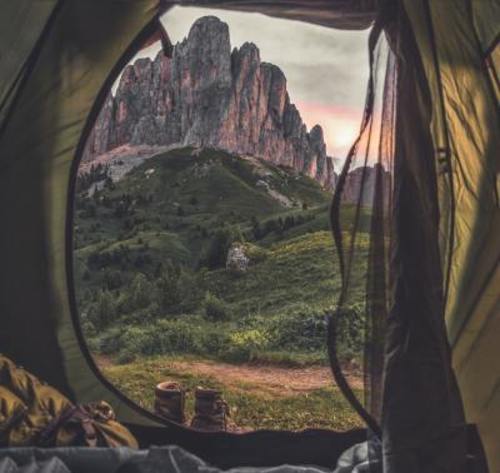 Looking outside tent door towards mountain