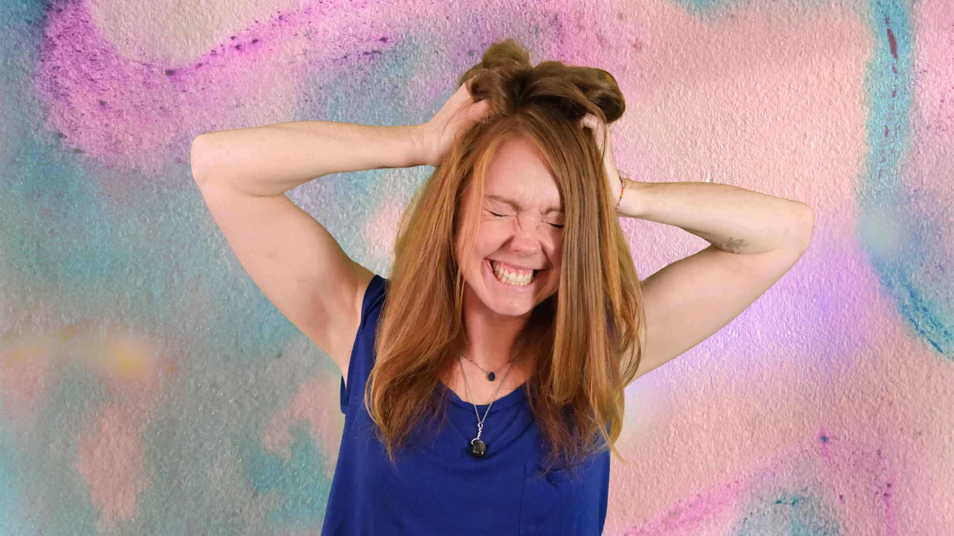 Making Mistakes Image of a watercolour background with Viki holding her hands to her hair and grimacing as if she has made a mistakes