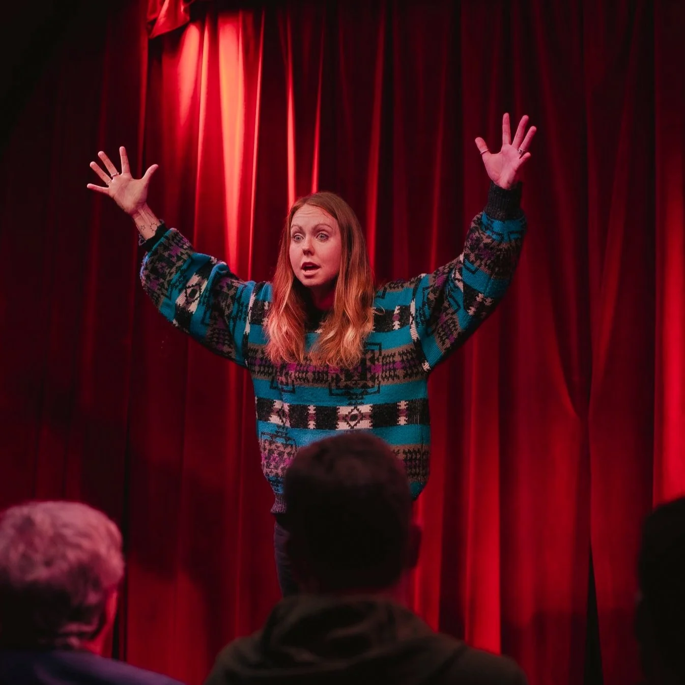 Viki-character-stage Viki (woman) as a character standing on stage with her arms in the air