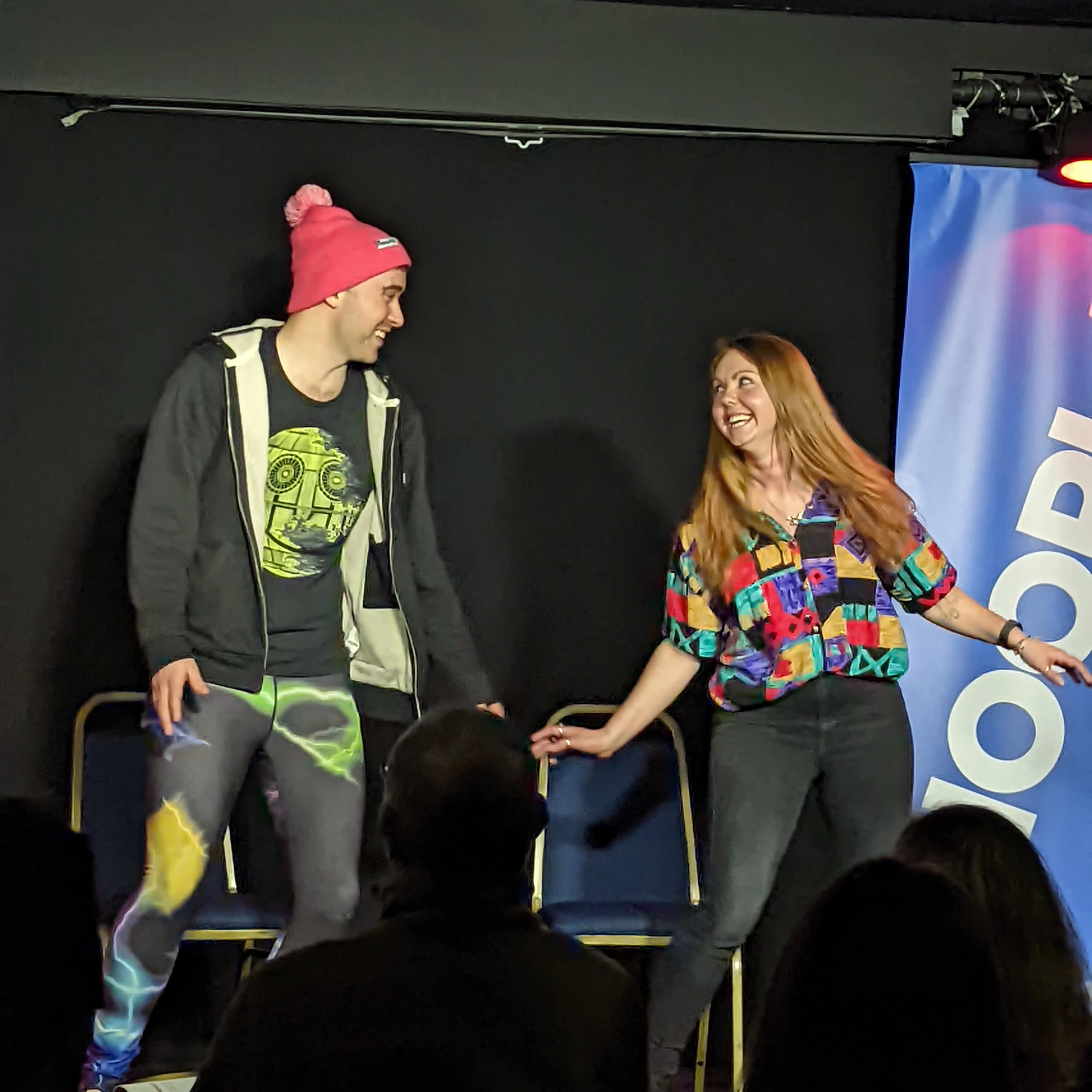 Charlie and Viki Jackson on stage Charlie Jackson and Viki Jackson on stage performing improv comedy