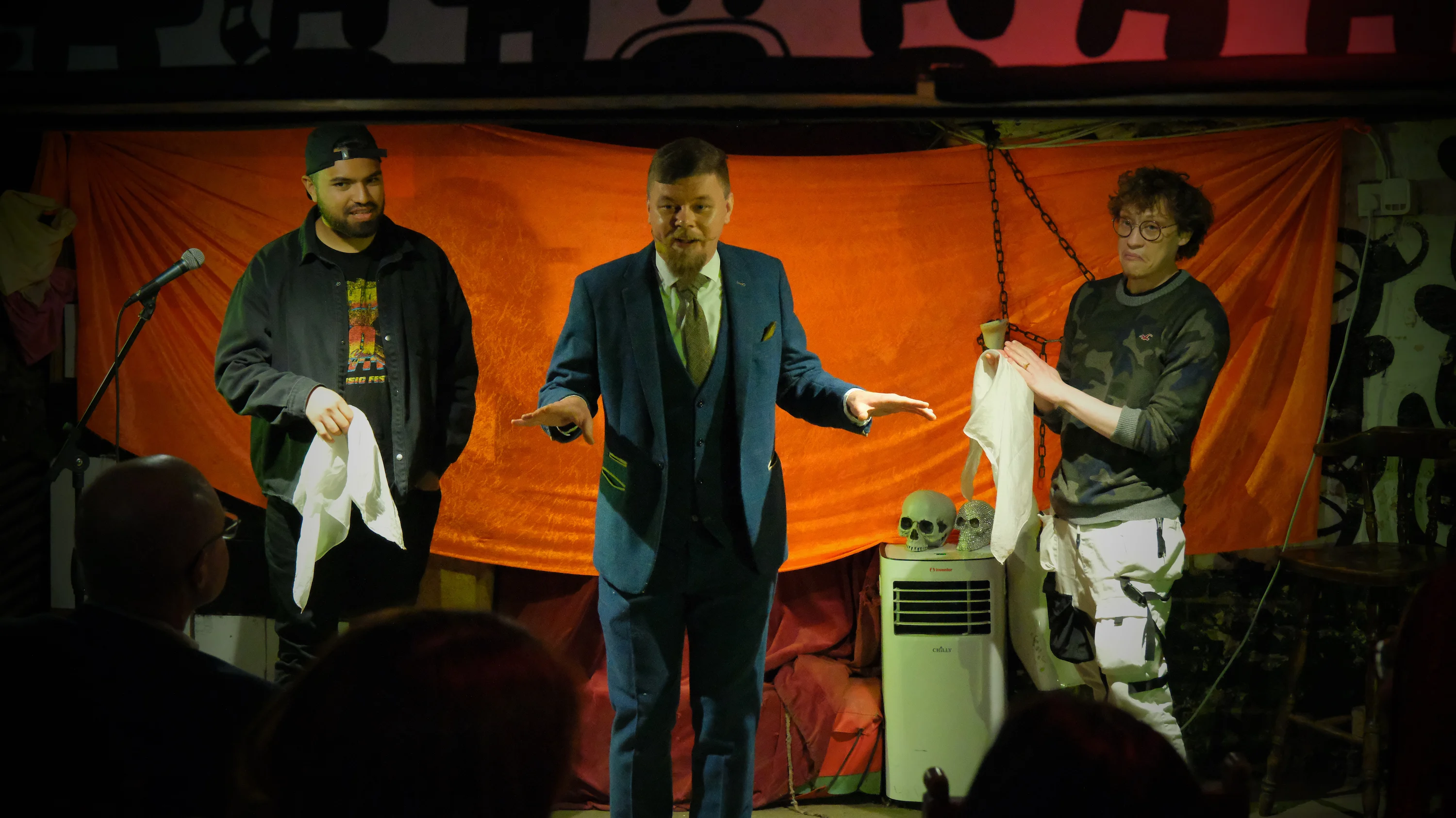 Modern Art April Adam B  Modern Art April Adam B Magician on stage with two audience members