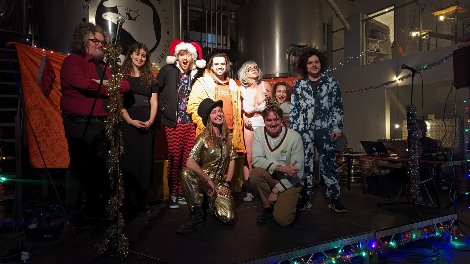 Modern Art Dec Comedians Group of comedians stood on stage