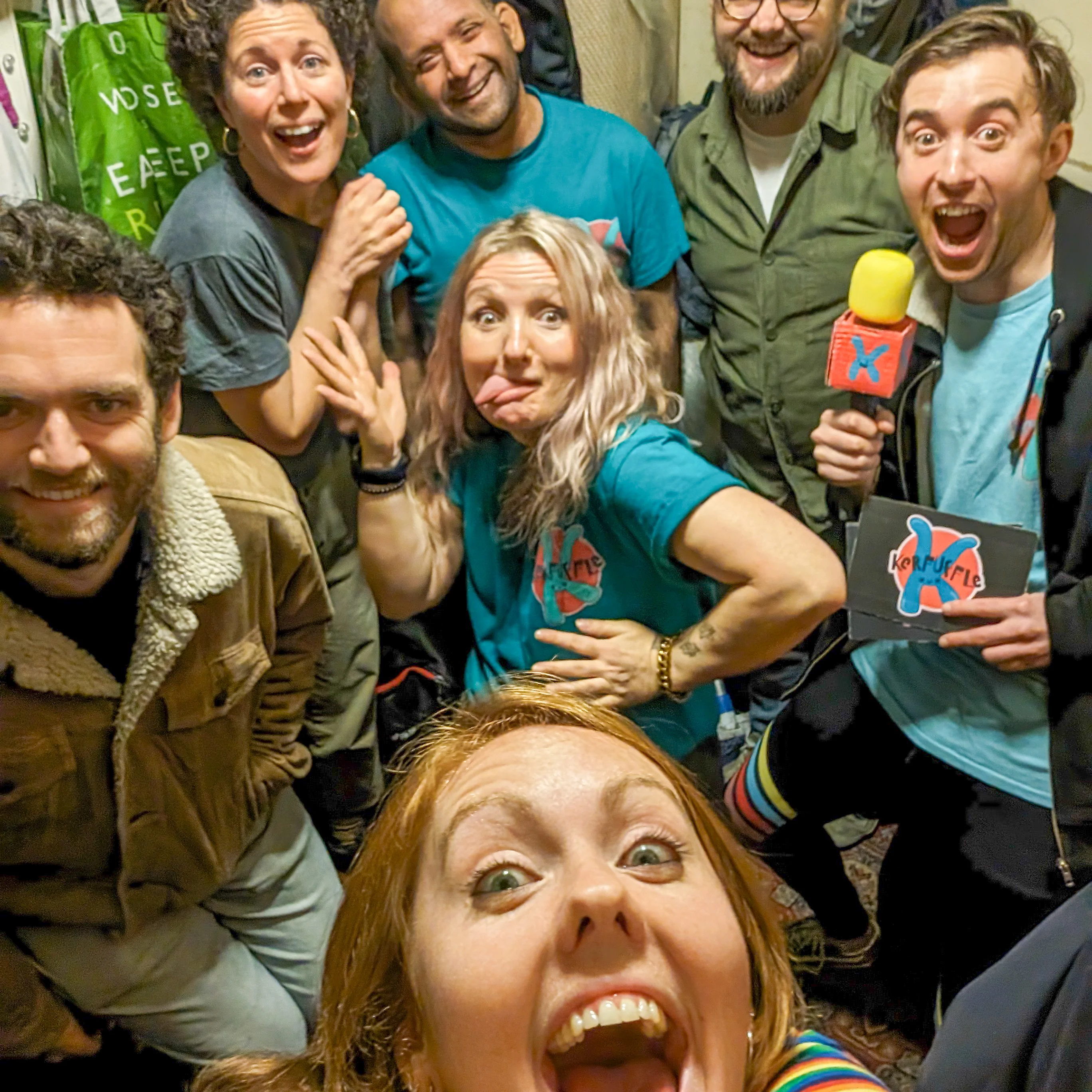 Kerfuffle backstage Seven people backstage before a show looking happy