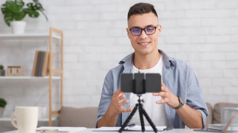 Man recording video - 7 Tips to Make Your Videos Look More Professional