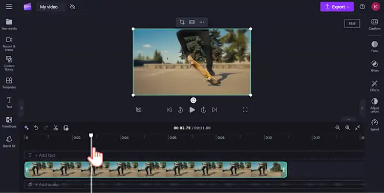 An image of a Clipchamp user dragging the seeker to the middle of a video clip.