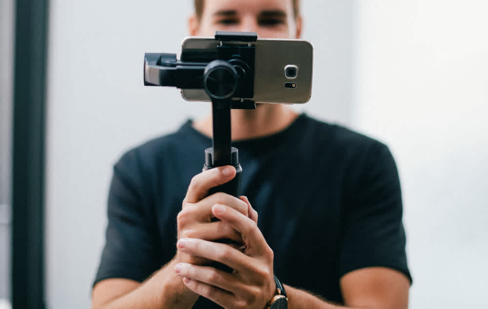 Man holding gimbal - Smartphone video recording - Everyday videoing tips