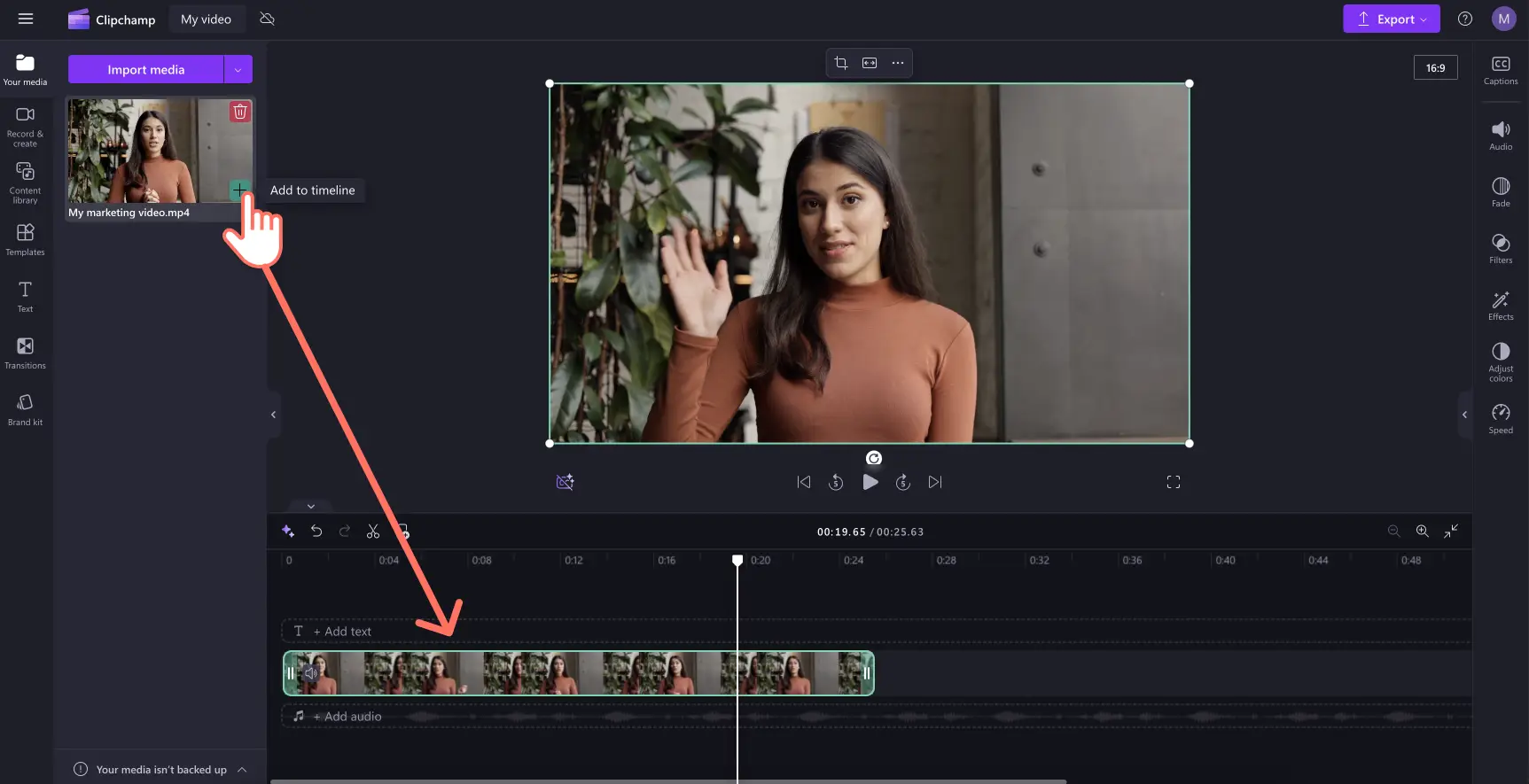 A user adding a video to the timeline in Clipchamp. 